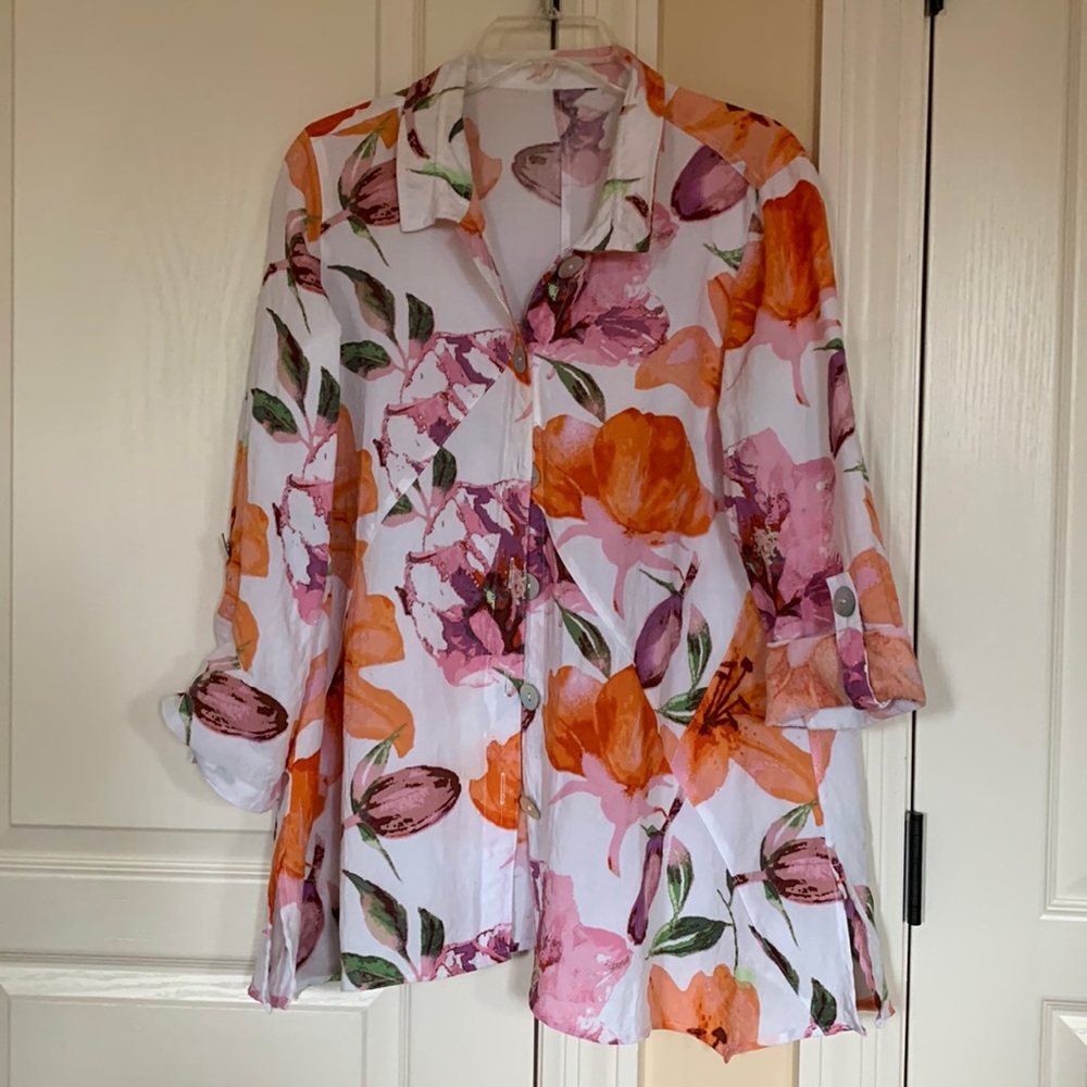 Flowered jacket/shirt. Lots of detailing.